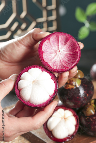 Fresh Mangosteen Fruit Cut Open Showing White Flesh Segments - Thai Tropical Fruit
