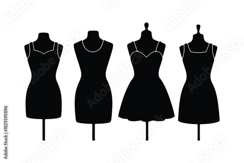 A silhouette of a black retro clothing mannequin.
Vintage female dress form mannequin.