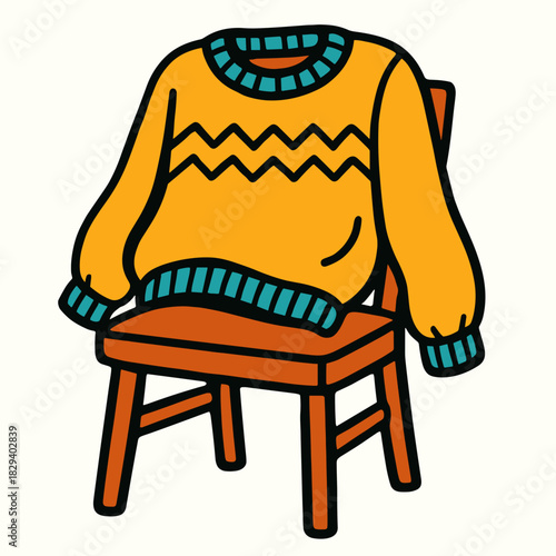 Knit sweater on chair back 