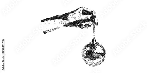 Elegant hand delicately holding a shimmering Christmas ornament, adding festive cheer and a touch of holiday magic perfect for seasonal campaigns