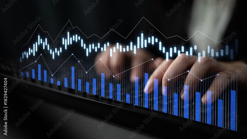 Naklejka premium A close-up of hands typing on a keyboard, surrounded by digital graphs and charts, representing data analysis and financial trends in a modern workspace. Scalp