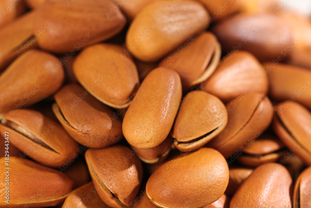 Obraz premium Fresh Hand-Peeled Pine Nuts Close-Up Macro Food Photography