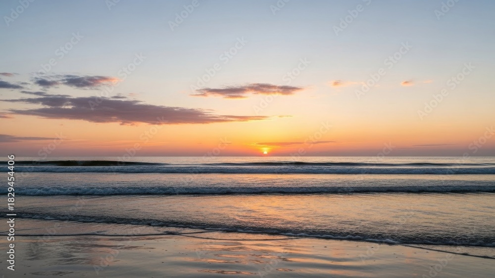 Obraz premium Stunning Coastal Sunset Reflection on the Wet Sand