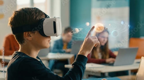 Wallpaper Mural Young student boy wearing a VR headset touching a virtual hologram of the solar system in a brightly lit classroom. Torontodigital.ca