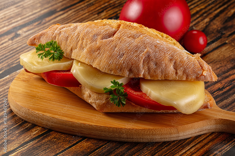 Obraz premium Sandwich with mozzarella and tomato