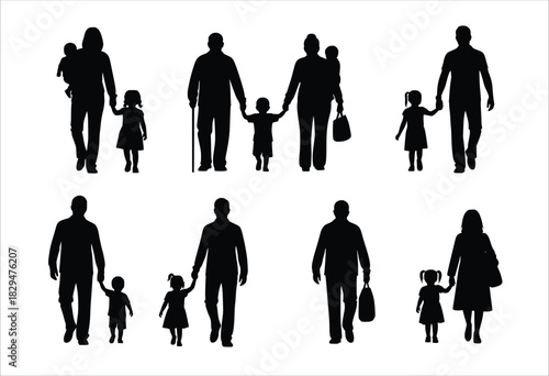 silhouettes of people walking with children