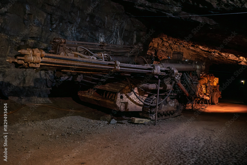 Fototapeta premium Old drilling jumbo in underground mine
