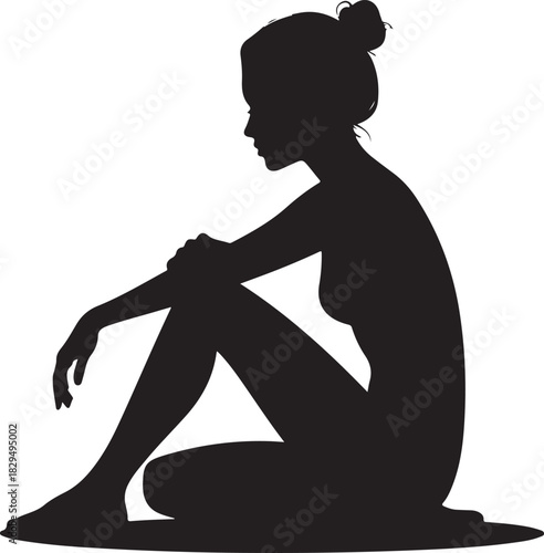 Silhouette of a thoughtful woman sitting alone in deep contemplation