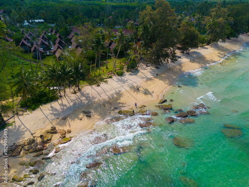 Tropical green forest island sea beach wave tranquil nature summer vacation