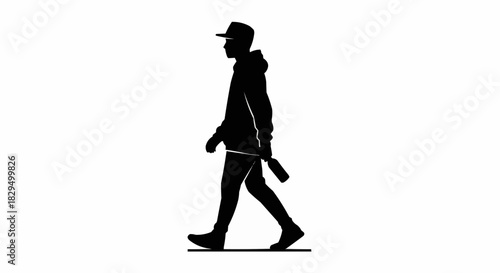 Black silhouette of a person in a hoodie and cap walking.