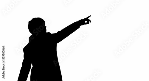 Silhouette of a man pointing forward with his arm extended.