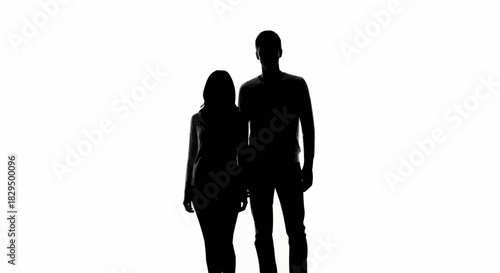 Silhouette of a couple standing together, looking forward, isolated on white background.