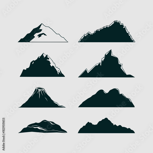 Set of nine different mountain silhouettes in black and white, showcasing various peak shapes and styles