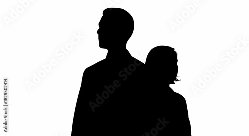 Silhouette of a Man and Woman Standing Back to Back.