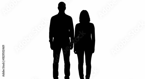 Silhouette of a Couple Standing Together in Darkness.