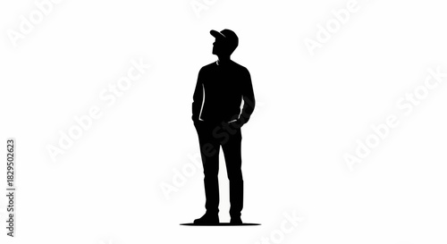 Silhouette of a man standing with a cap looking up, hands in pockets.