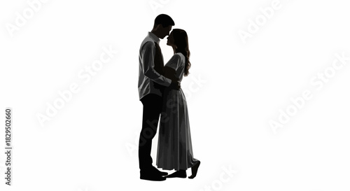 Black and white silhouette of a romantic couple embracing tenderly.