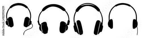 A collection of four black and white headphones in a row with varying styles and cable positions displayed