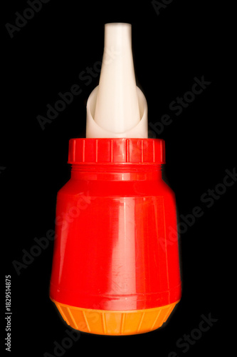 Inhaler for a runny nose on a black background.