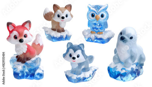 Icy Translucent Figurines of Festive Arctic Animals on Isolated Background