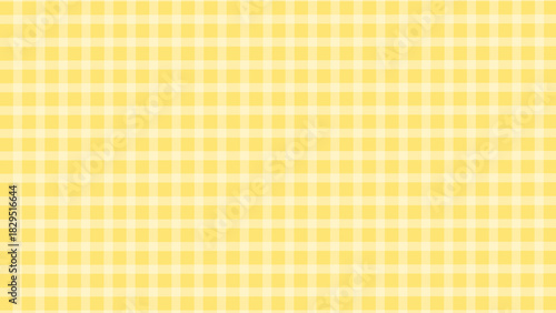 Yellow and white plaid fabric texture background. Seamless pattern checkered wallpaper.