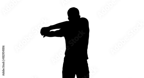 Silhouette of a man stretching his arms across his chest in a white background studio shot