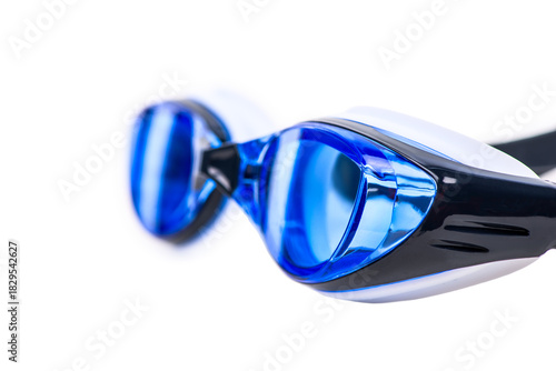 Sports swimming goggles with blue lenses on white