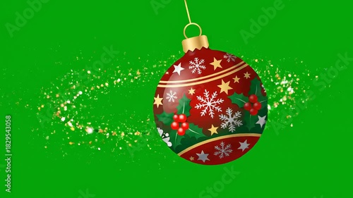 Christmas bauble hanging with golden glitter particles isolated on green screen for seasonal broadcast projects