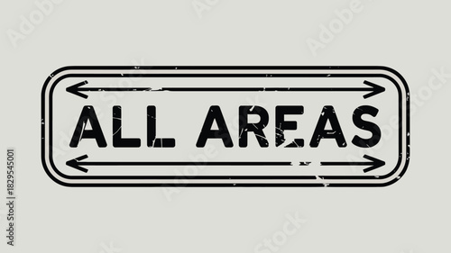 A black and white sign with the words all areas and arrows pointing in both directions on a gray background