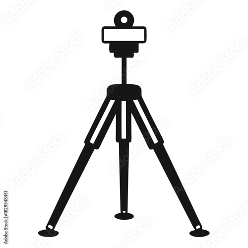 A minimalistic black tripod stands firmly ready to hold equipment for shooting photographs