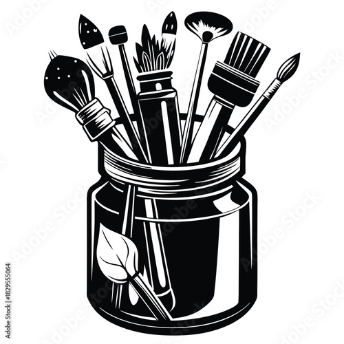 Monochrome jar showcasing numerous artist paintbrushes with a leaf displayed prominently on its side
