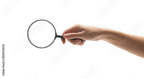 Hand holding a magnifying glass isolated on a transparent background
