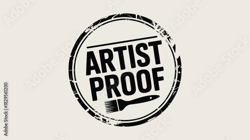 A black artist proof stamp with a line above the text and a paintbrush below against a cream background