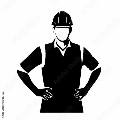 Silhouette of a construction worker wearing a hard hat.