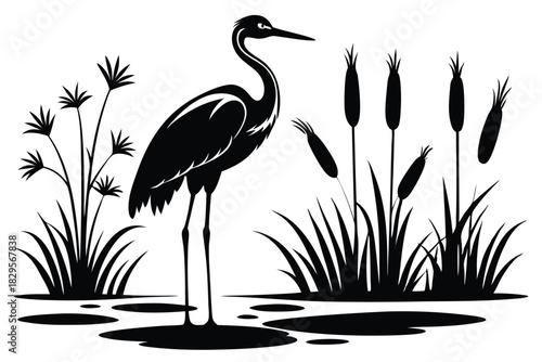 Solitary heron silhouette gracefully stands among cattails and water foliage in a wetland