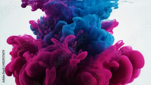 Red Ink Spreads and Flows in Water on White Background