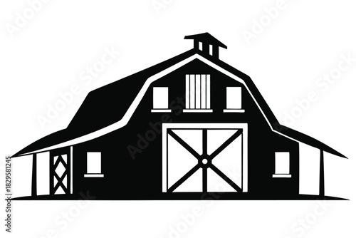 Silhouette of a barn with a gambrel roof and large crossbuck doors visible