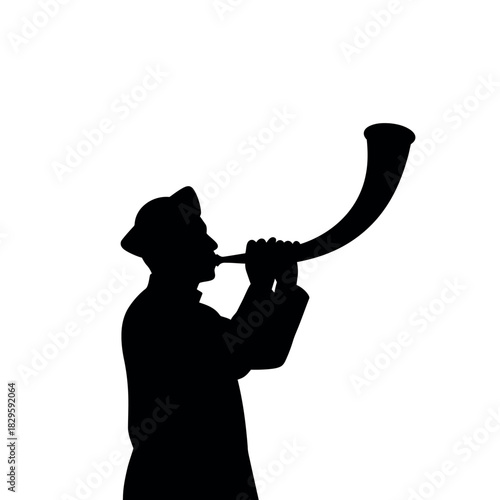 Silhouette of a man playing a horn instrument.