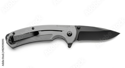 Monochromatic folding knife showcasing precision engineering and sleek design with pocket clip and