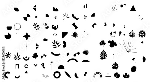 Monochrome collage of animal and plant silhouettes forming a decorative pattern for design and artwork.