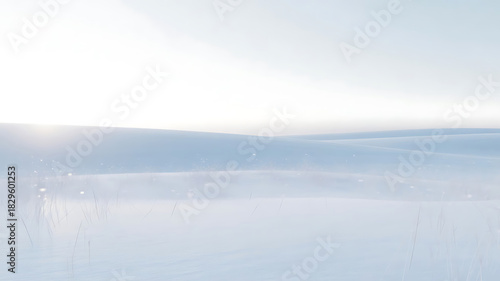 Fototapeta Naklejka Na Ścianę i Meble -  : A serene, soft blue and white landscape featuring gentle snow dunes and a bright horizon with falling snow.