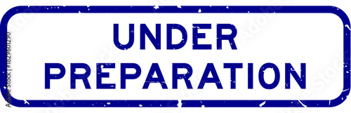 Grunge blue under preparation word square rubber seal stamp on white background
