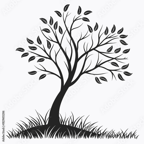 A stylized black silhouette of a deciduous tree with sparse leaves stands proudly in a patch of detailed grass against a plain white background