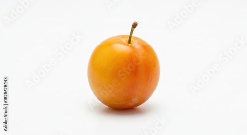 Single ripe yellow plum with a stem on a plain white background.