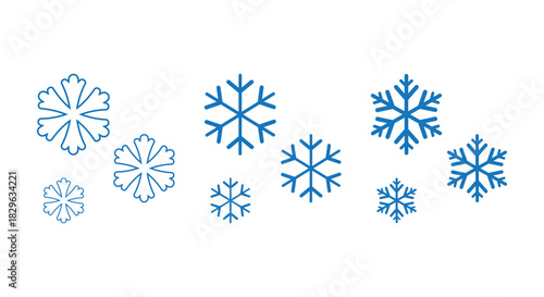 Collection of stylized blue snowflakes in various sizes and designs on a clean white background, ideal for winter icons, Christmas decorations, web graphics, packaging, patterns and seasonal design pr
