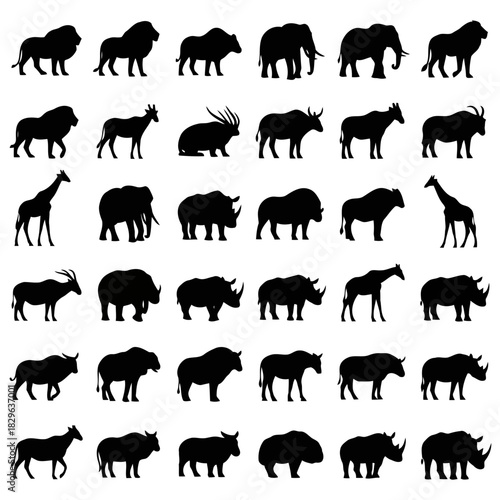 Set of black silhouettes of various wild animals including lions, giraffes, and buffaloes standing in different poses