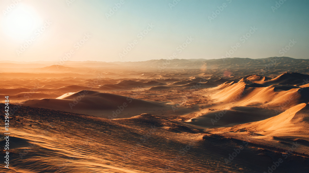 Fototapeta premium Vast desert landscape under a bright sun with rolling sand dunes