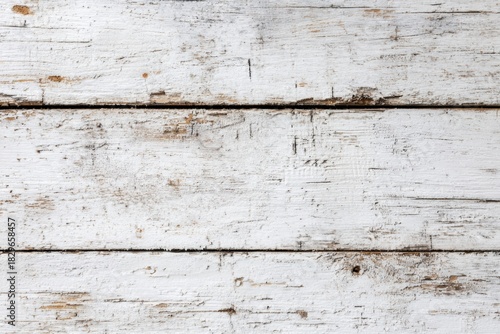 Weathered Wood Texture: Capturing the timeless beauty of worn, white-painted wooden planks. The image displays a detailed view of the rough, textured surface with hints of the original wood grain.