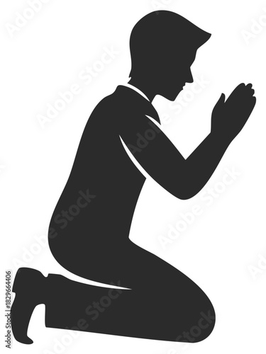 Silhouette of a person kneeling in prayer or meditation