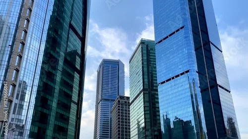 Wallpaper Mural Modern Glass Skyscrapers in City Business District Against Blue Sky Torontodigital.ca